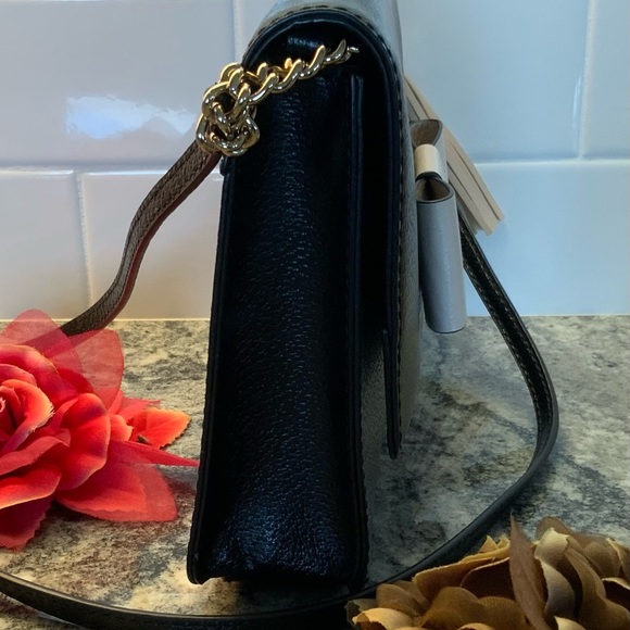 BUY IT NOW. NWOT, Kate Spade Robinson Street Crossbody Handbag Black/cream bow. - Picture 8 of 10